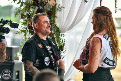 The couple exchanging vows on the mainstage during Wacken Open Air 2026.