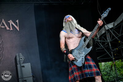 Bassist of Cruachan during performance at Wacken Open Air 2026