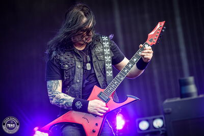 Michael Amott of Arch Enemy performing a guitar solo at Wacken Open Air 2026