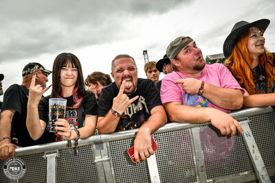 Fans in the front row during Grand Magus's set at Wacken Open Air 2026.