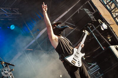 Charley Ruddell, bassist of Castle Rat, performing on stage at Wacken Open Air 2026